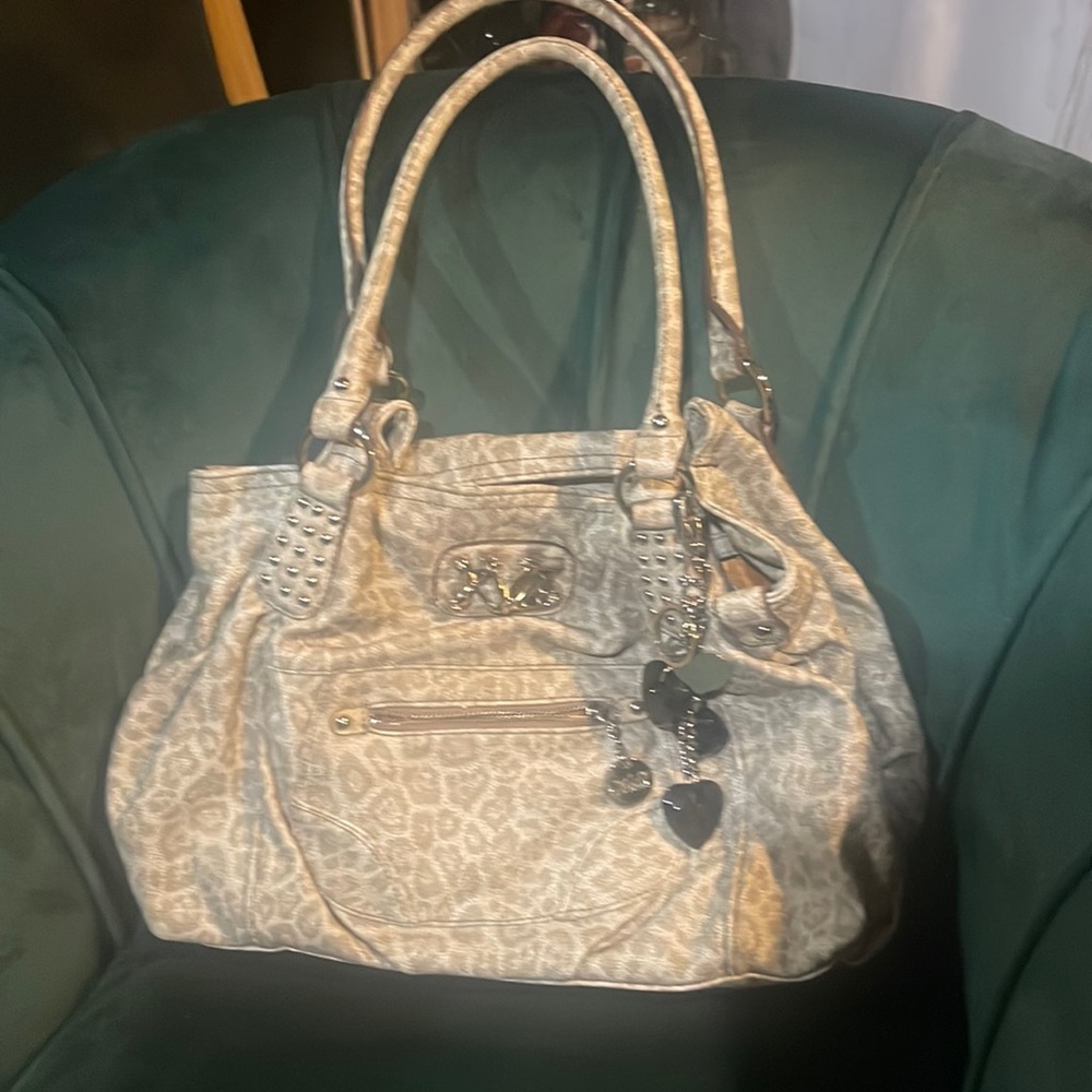 Kathy Van Zeeland cream and tan tones leopard print hobo bag, new without tags.